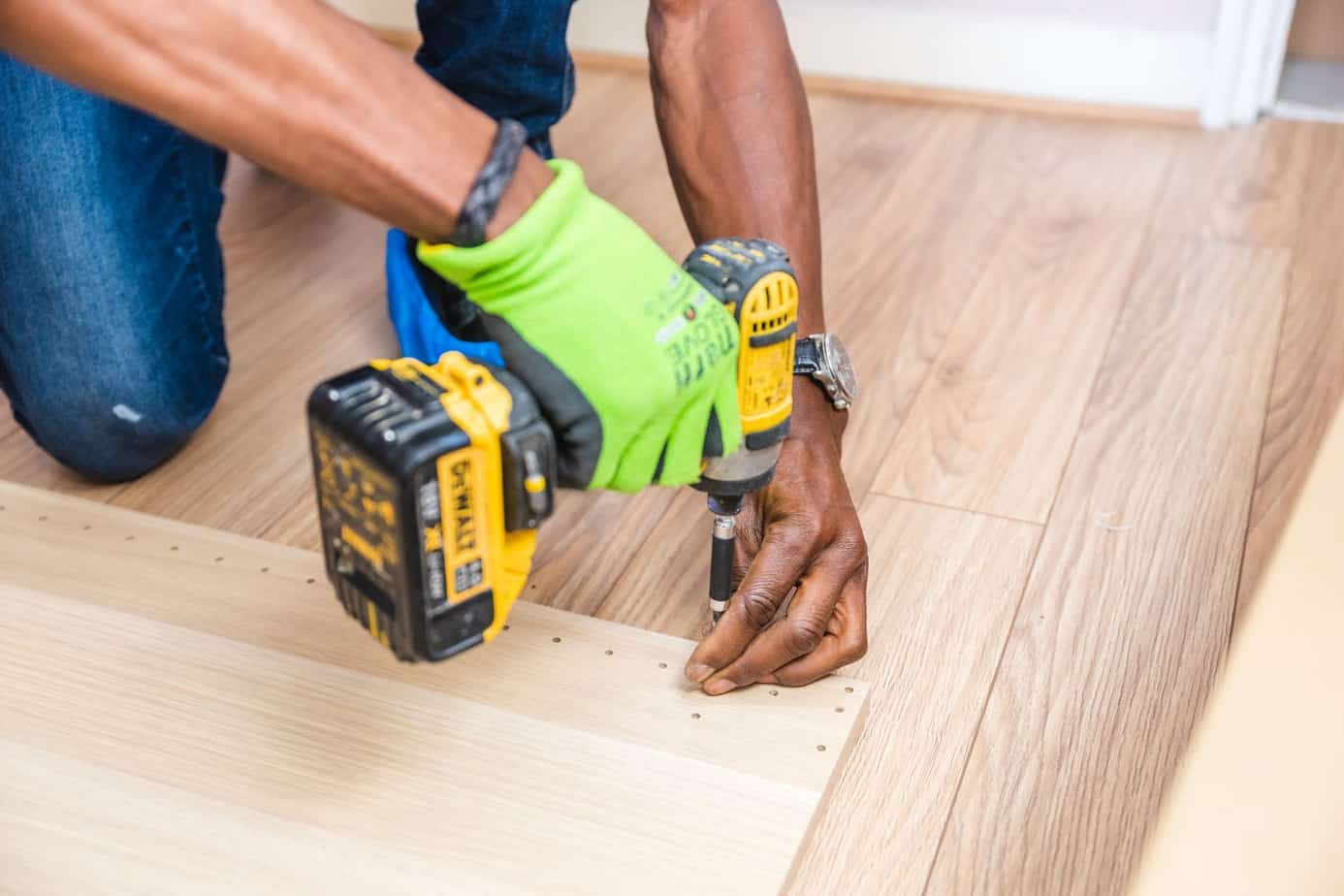 Being a great DIY handy person is a great way to become more self sufficient and one of my tips to make yourself more self reliant today! | My Family Ties | person holding dewalt cordless hand drill