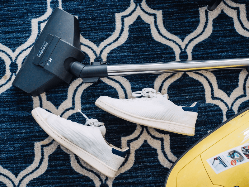Vacuum cleaner and white and blue trainers or sneakers on blue and white patterned carpet.
From slovenly to spotless: quick spring cleaning hacks to keep your home clean and organized. Cleaning Tips and lifehacks to keep your home tidy, organized and clean. Your Spring cleaning schedule doesn't need to take hours, with these cleaning tips you can clean your home in no time. Start a Spring cleaning routine to organize and clean your home in less time.