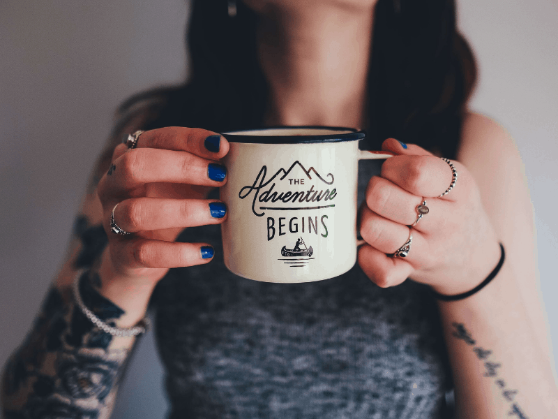 Woman with tattoos holding The Adventure Begins cup.
Turning your hobby into a business has never been more profitable. Here are 3 of the most profitable products to make at home and sell online so you can start your side hustle or small business today.