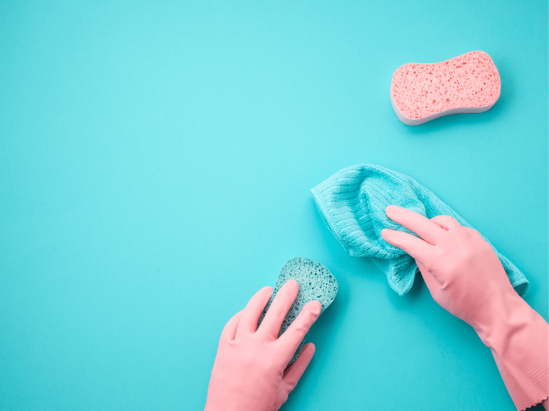 Blue Cleaning sponge and cloth with pink rubber gloves.
Spring Clean your home with lifehacks and tips to clean faster so that your home looks clean and tidy no matter what time of year.  Even if you are feeling lazy these Spring cleaning hacks will help your home look spotless and tidy in no time.