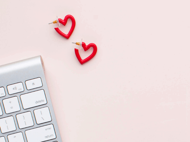 pink desk background, keyboard, red heart earrings, tips to SEO blog posts, social squares, 